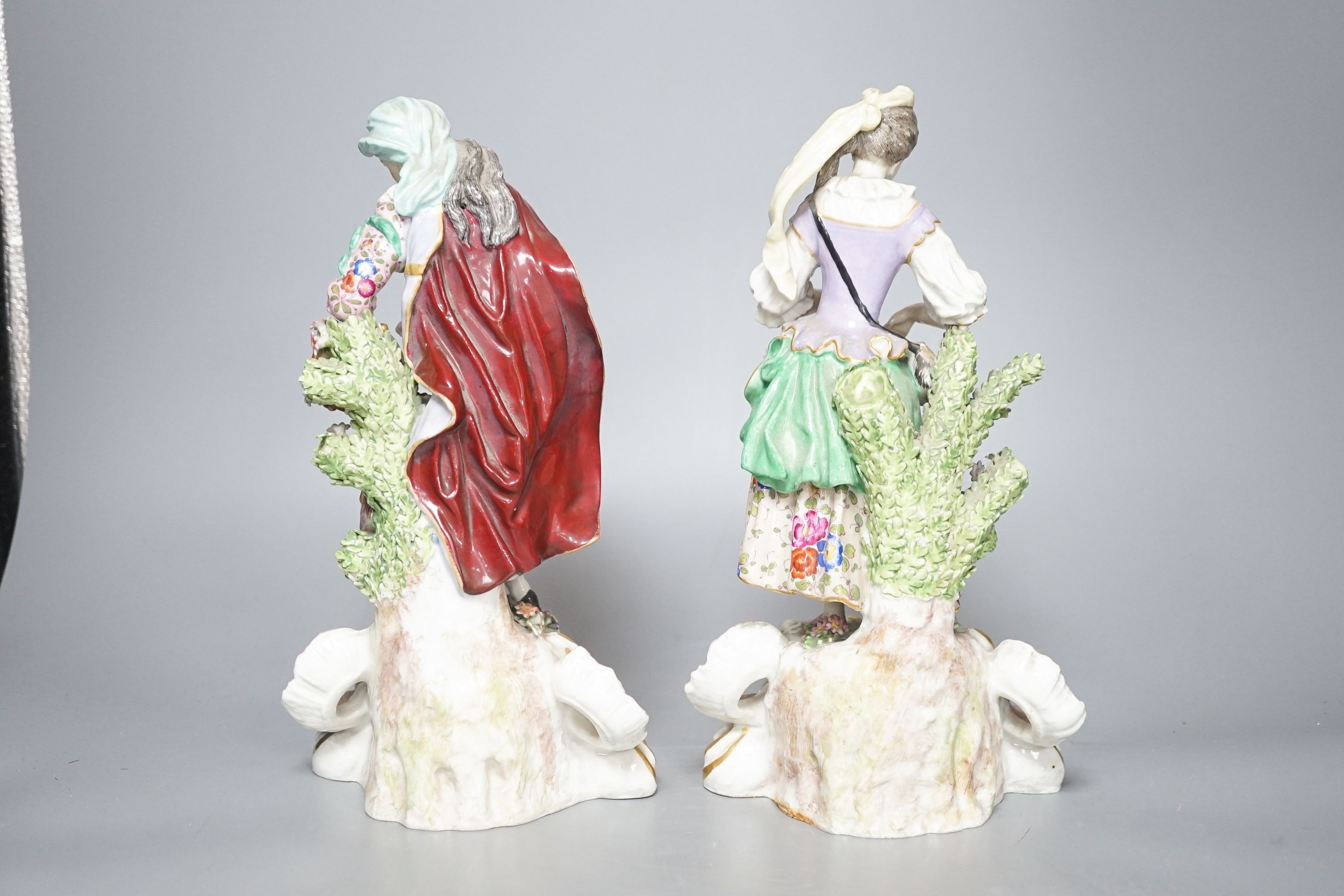 Two Continental porcelain figures, a lady and a gent 27cm